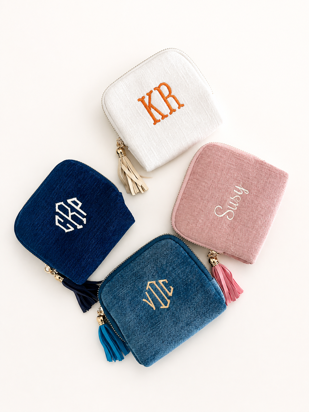 Personalized Figstitch zip pouches photographed in professional studio light