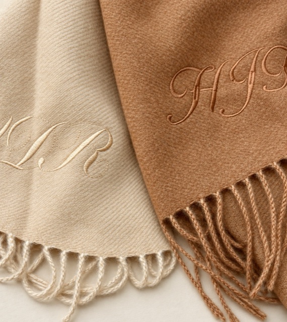 Fringed monogrammed textiles