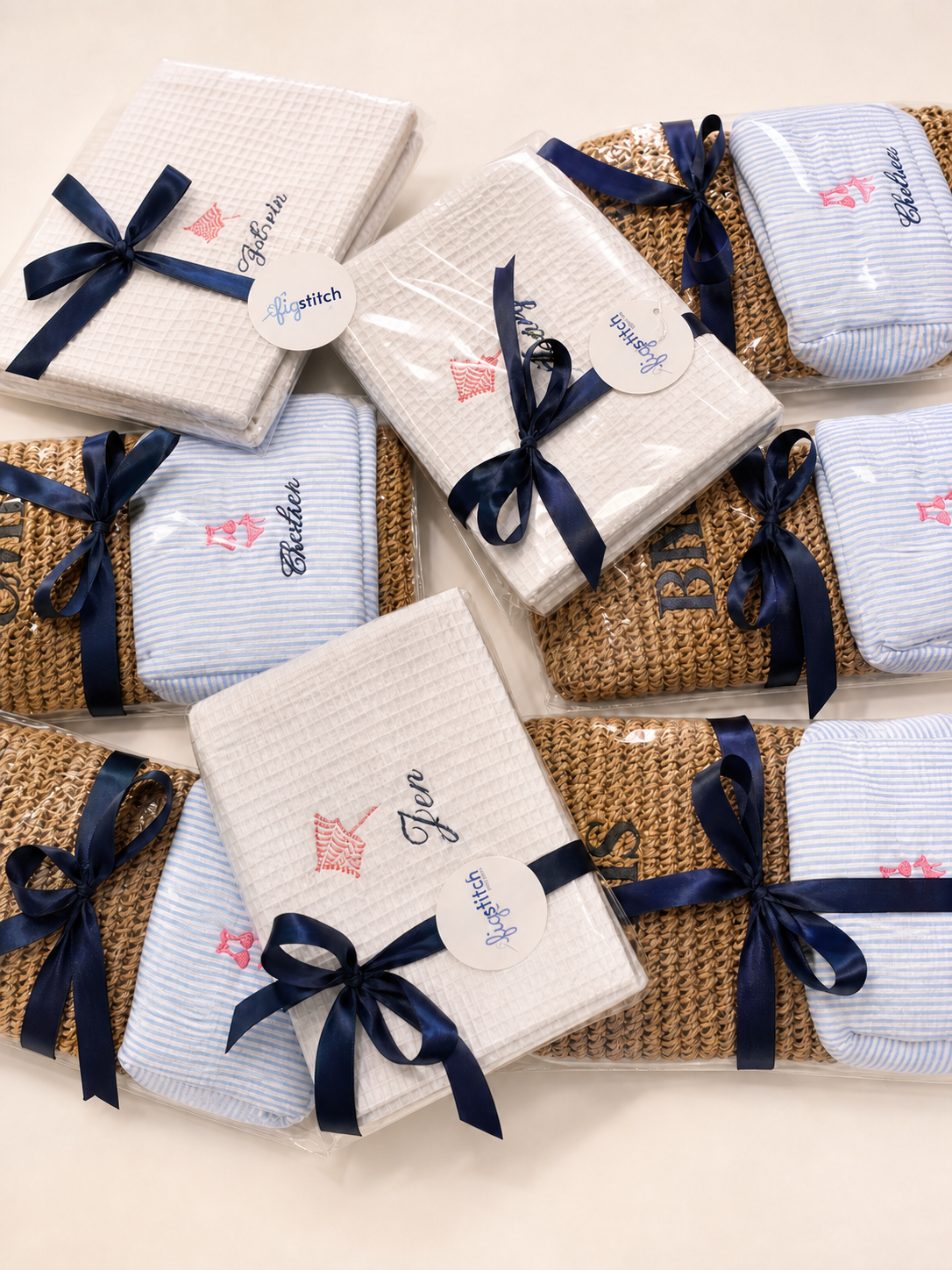 Finished Figstitch embroidery gifts wrapped with navy ribbons